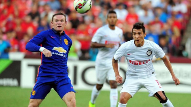 Pemain Manchester United, Wayne Rooney pada laga melawan Inter Milan.