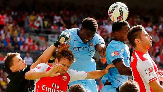 Arsenal melawan Manchester City.