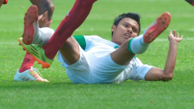 Pemain Indonesia, Fandi Eko Utomo, di Asian Games 2014