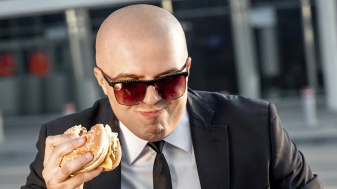 ilustrasi pria makan burger