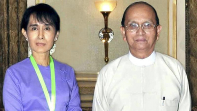 Aung San Suu Kyi (kiri) dan Presiden Myanmar Thein Sein (kanan)