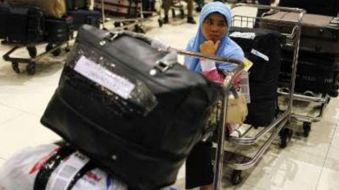 Pekerja migran Indonesia menunggu pengurusan dokumen di bandara Soekarno-Hatta.