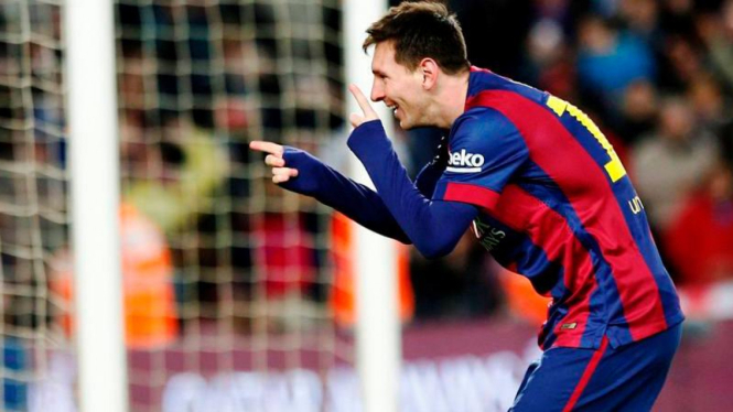 Penyerang andalan Barcelona, Lionel Messi merayakan gol