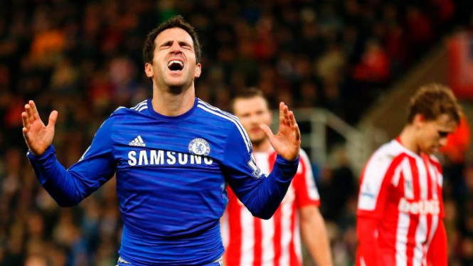 Reaksi pemain Chelsea, Cesc Fabregas, usai cetak gol
