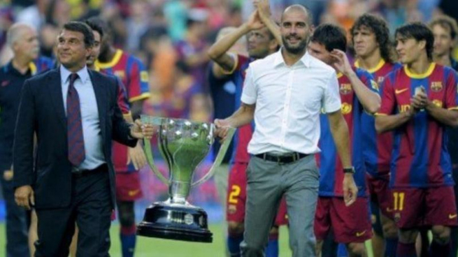 Eks presiden Barcelona, Joan Laporta, dan Pep Guardiola.