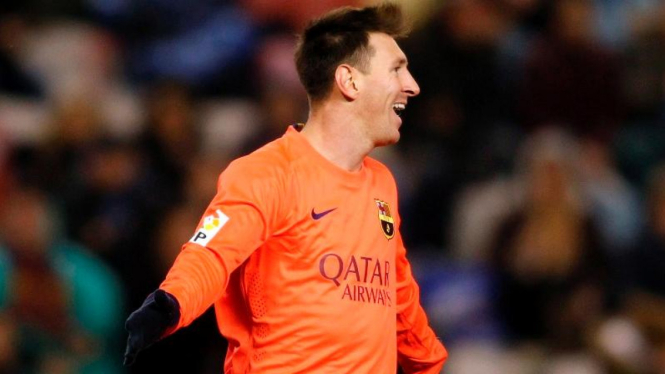 Penyerang Barcelona, Lionel Messi merayakan gol ke gawang Deportivo