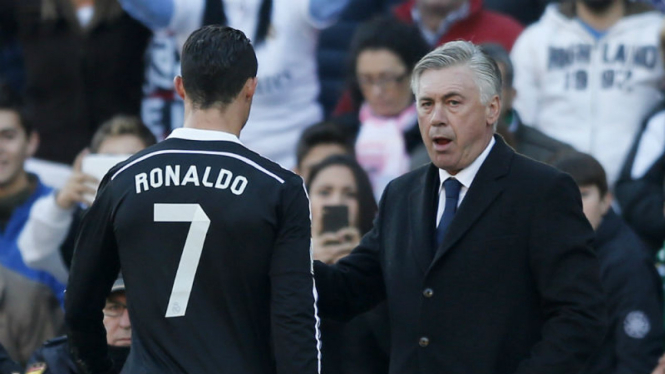 Cristiano Ronaldo (kiri) dan Carlo Ancelotti