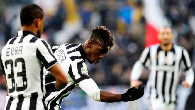 Pemain Juventus, Paul Pogba, merayakan gol
