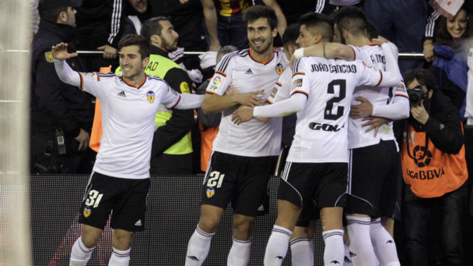 Selebrasi pemain Valencia usai cetak gol ke gawang Sevilla