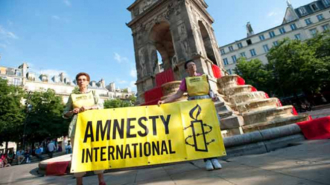 Ilustrasi aksi protes Amnesti Internasional