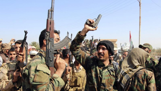 Pasukan Irak dan milisi Syiah di Udhaim, utara Baghdad, 1 Maret 2015