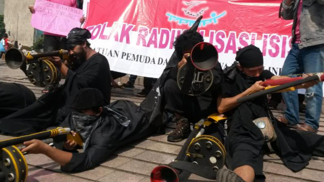 Aksi mahasiswa menolak ISIS di Bundaran HI Jakarta, Minggu 15/3/2015
