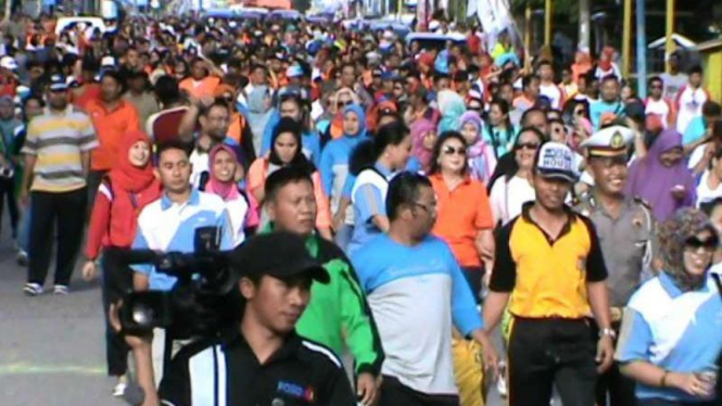 Ribuan Warga Poso Turun ke Jalan Nyatakan Situasi Aman