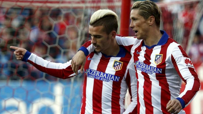 Dua penyerang Atletico Madrid, Antoine Griezmann dan Fernando Torres