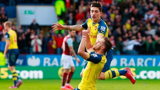 Selebrasi pemain Arsenal, Aaron Ramsey merayakan gol ke gawang Burnley