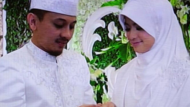 Yulia Rahman dan suami