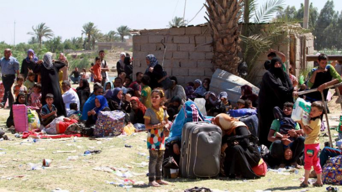 Warga  Irak di pengungsian.