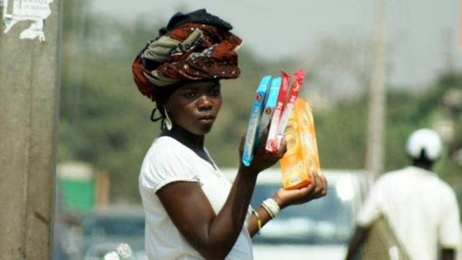 Pedagang makanan di Angola. (Business Insider)