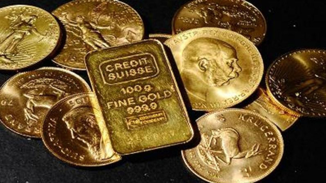 Koin dan batangan emas. (CNBC)