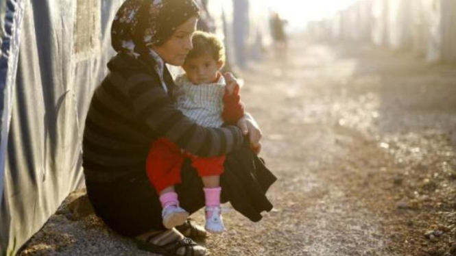 Perempuan dan anak pengungsi di Suriah.