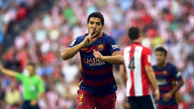 Penyeran Barcelona, Luis Suarez usai mencetak gol ke gawang Bilbao.