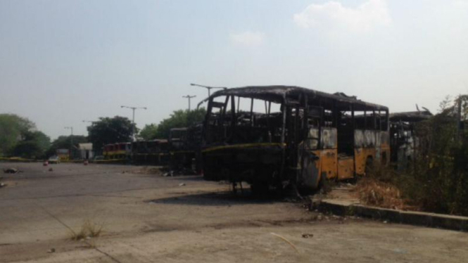 Ilustrasi bus TransJakarta terbakar.