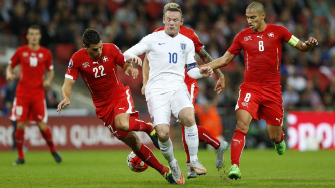 Wayne Rooney beraksi dalam pertandingan melawan Swiss di Wembley