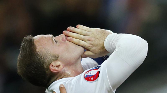 Rooney merayakan golnya yang ke-50 di Wembley.