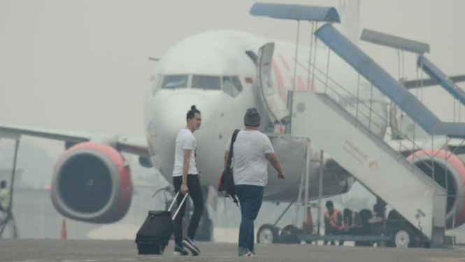 Bencana kabut asap membuat bandar udara lumpuh