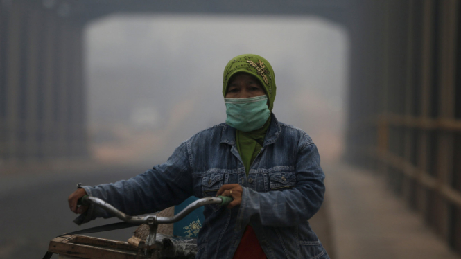 Kabut Asap di palembang, Warga Shalat Minta Hujan