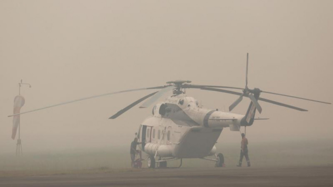 Pesawat BNPB terhalang kabut asap