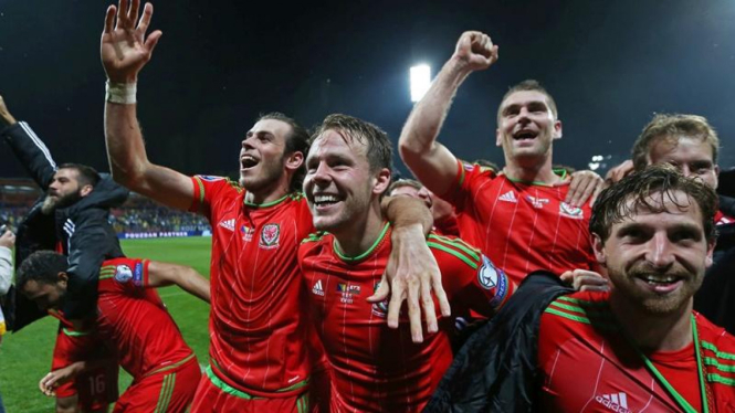 Para pemain Wales usai dipastikan lolos ke babak utama Piala Eropa 2016