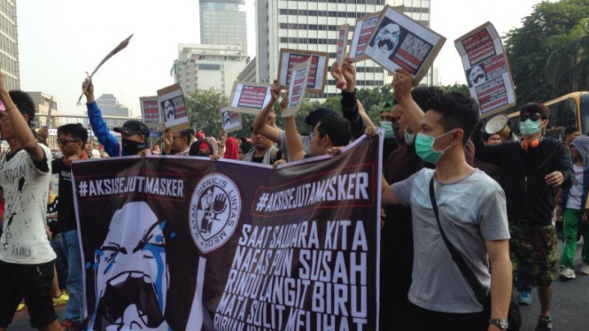 Aksi yang digelar Ikatan Jurnalis Lintas Media di Bundaran HI. 
