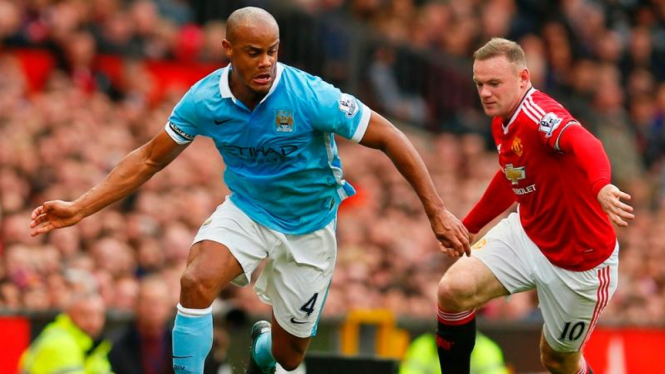 Wayne Rooney (kanan) dan Vincent Kompany