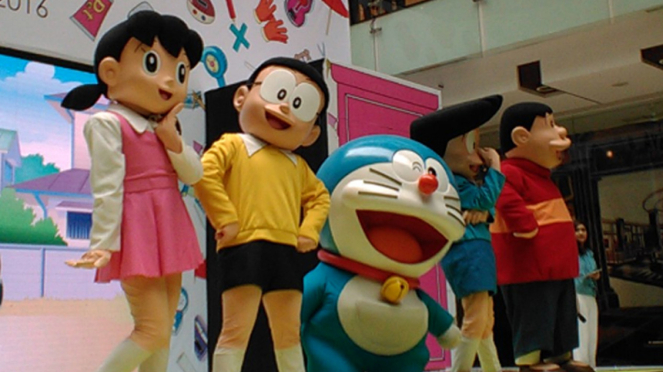 Ilustrasi belajar bahasa Doraemon.