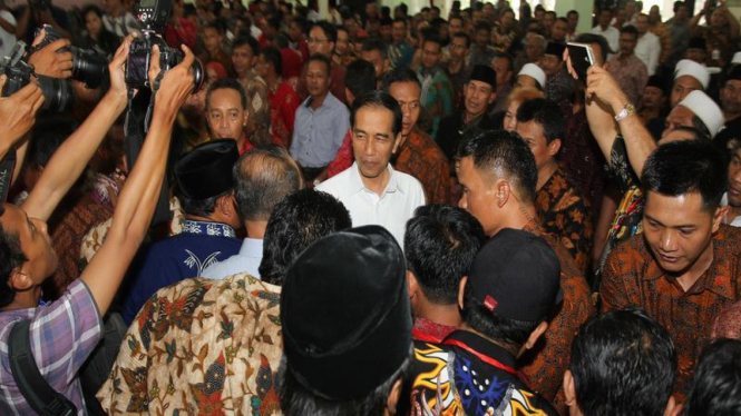 Presiden Joko Widodo saat bersama para kepala desa se-Indonesia.