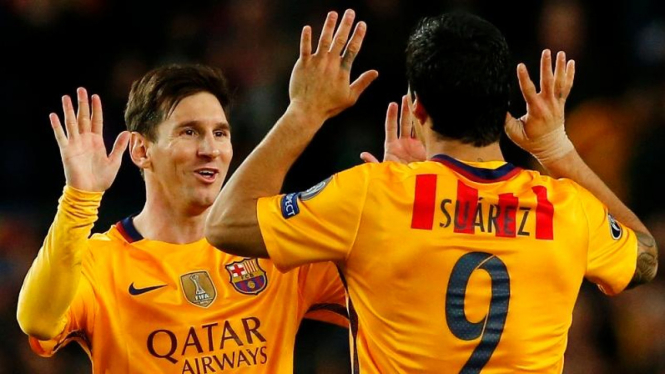 Pemain Barcelona, Lionel Messi dan Luis Suarez.