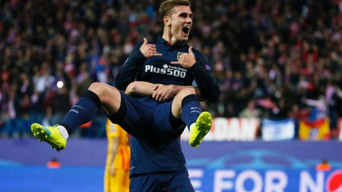 Penyerang Atletico Madrid, Antoine Griezmann, melakukan selebrasi gol.