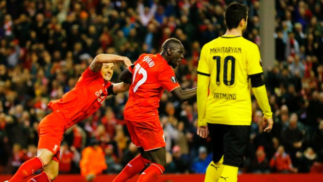 Para pemain Liverpool merayakan kemenangan atas Borussia Dortmund.