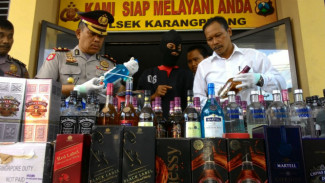 Pengoplos Miras dengan Zat Pewarna dan Lem Dicokok Polisi