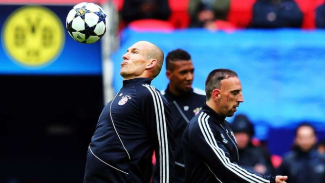 Dua bintang Bayern Munich, Arjen Robben (kiri) dan Franck Ribery (kanan)