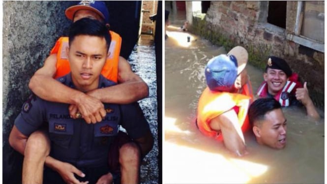  Bripda Erlangga harus mengevakuasi warga yang kebanjiran ke Kecamatan Baleendah, Kabupaten bandung, Jawa Barat.