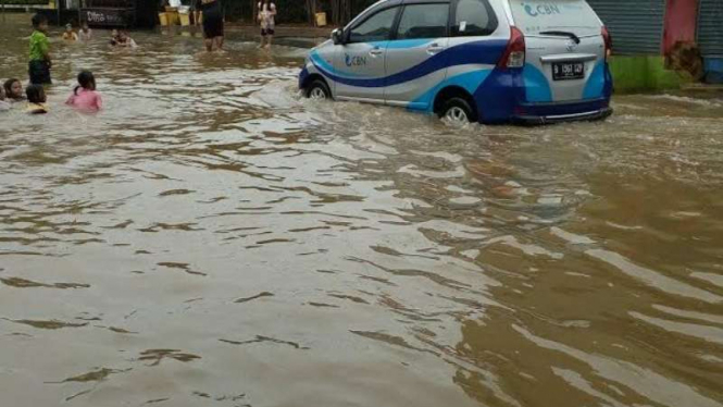 Banjir di pemukiman warga di Cimanggis, Depok.