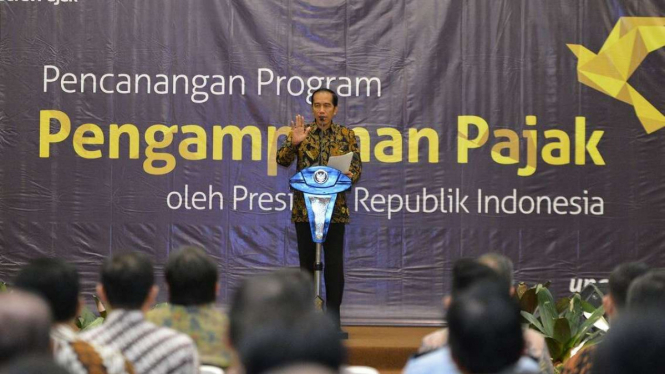 Presiden Jokowi saat pencanangan program pengampunan pajak