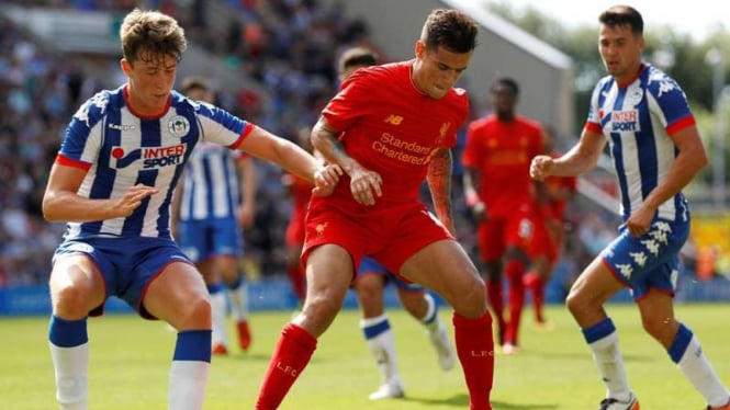 Gelandang Liverpool, Philippe Coutinho saat bersua Wigan Athletic