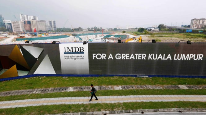 Papan bertuliskan 1 Malaysia Development Berhad (1MDB) di Tun Razak Exchange, Kuala Lumpur, 1 Maret 2015.