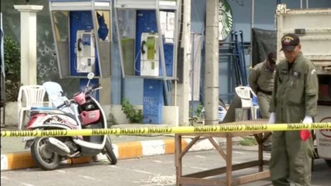 Polisi Thailand berjaga di suatu tempat kejadian perkara beberapa waktu silam.