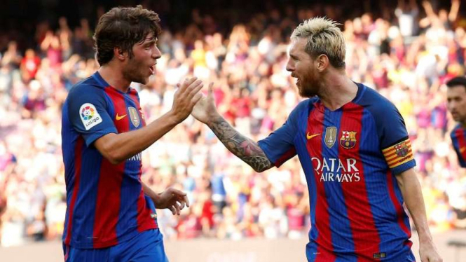 Bek Barcelona, Sergi Roberto (kiri) dan Lionel Messi.