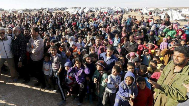 Ilustrasi pengungsi dari Suriah menuju Turki.