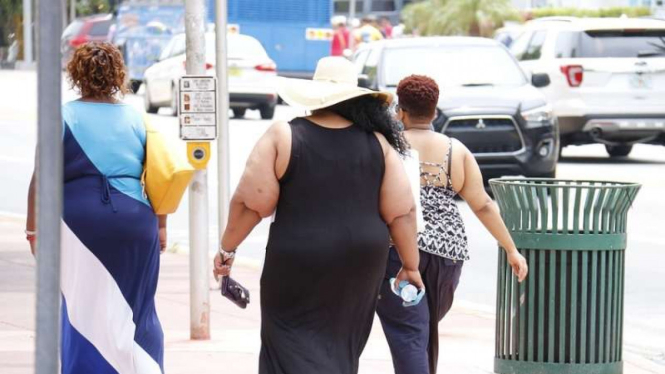 wanita Obesitas liburan